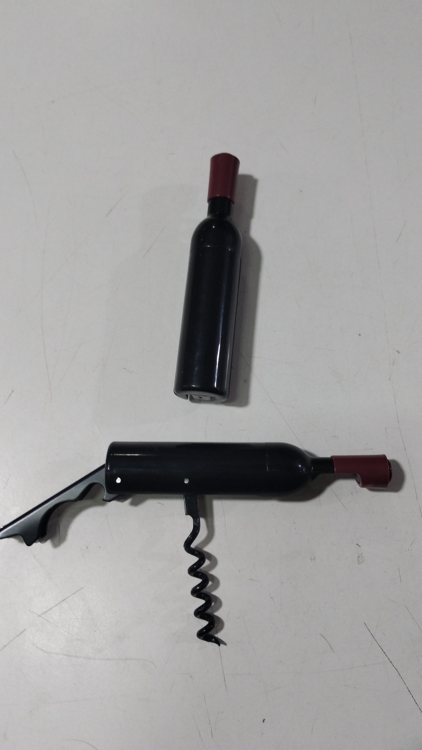 SACA CORCHO FORMA DE BOTELLA